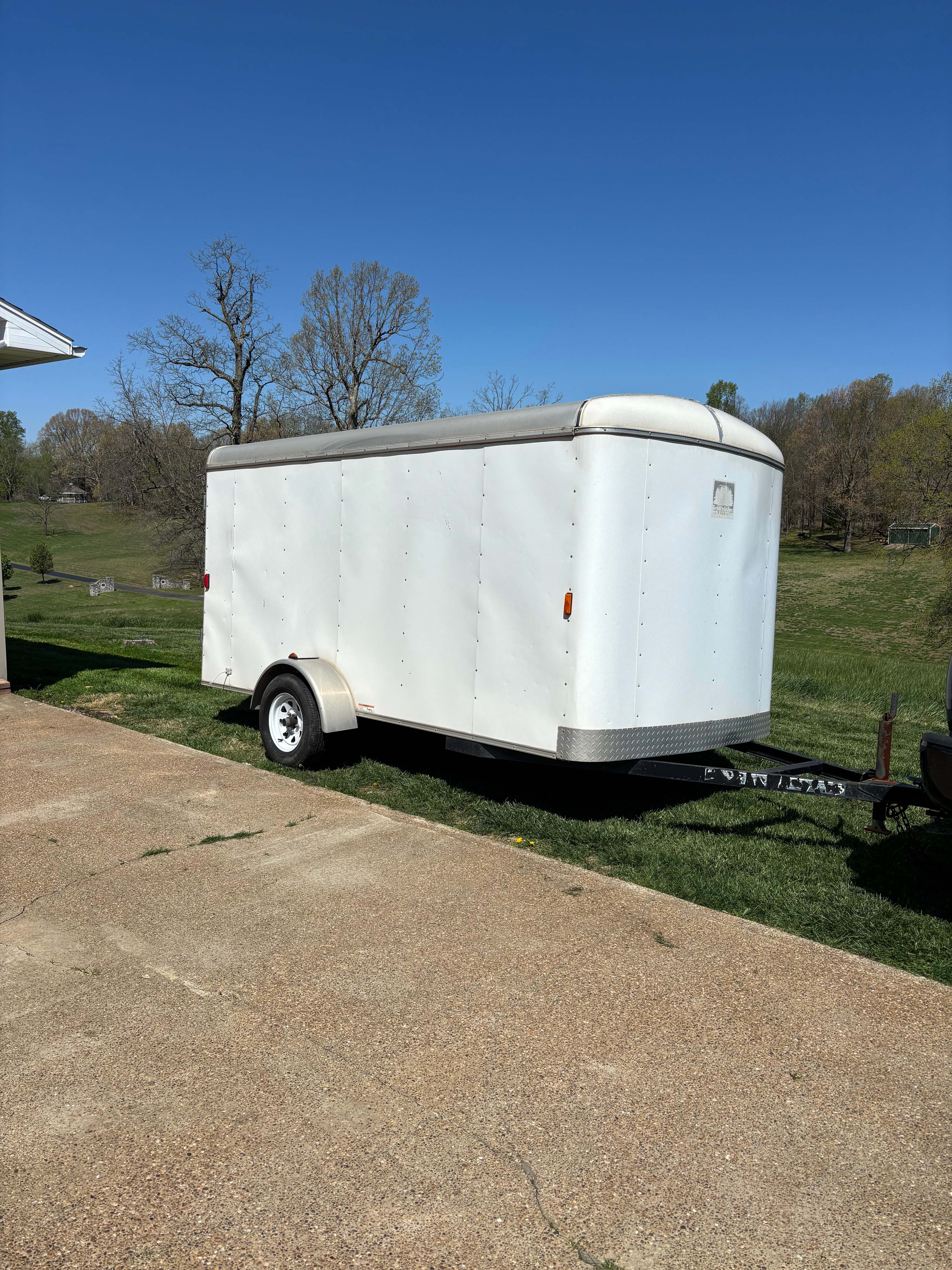 Enclosed cargo trailer rental Madisonville Kentucky - Weatherproof trailer for secure equipment transport